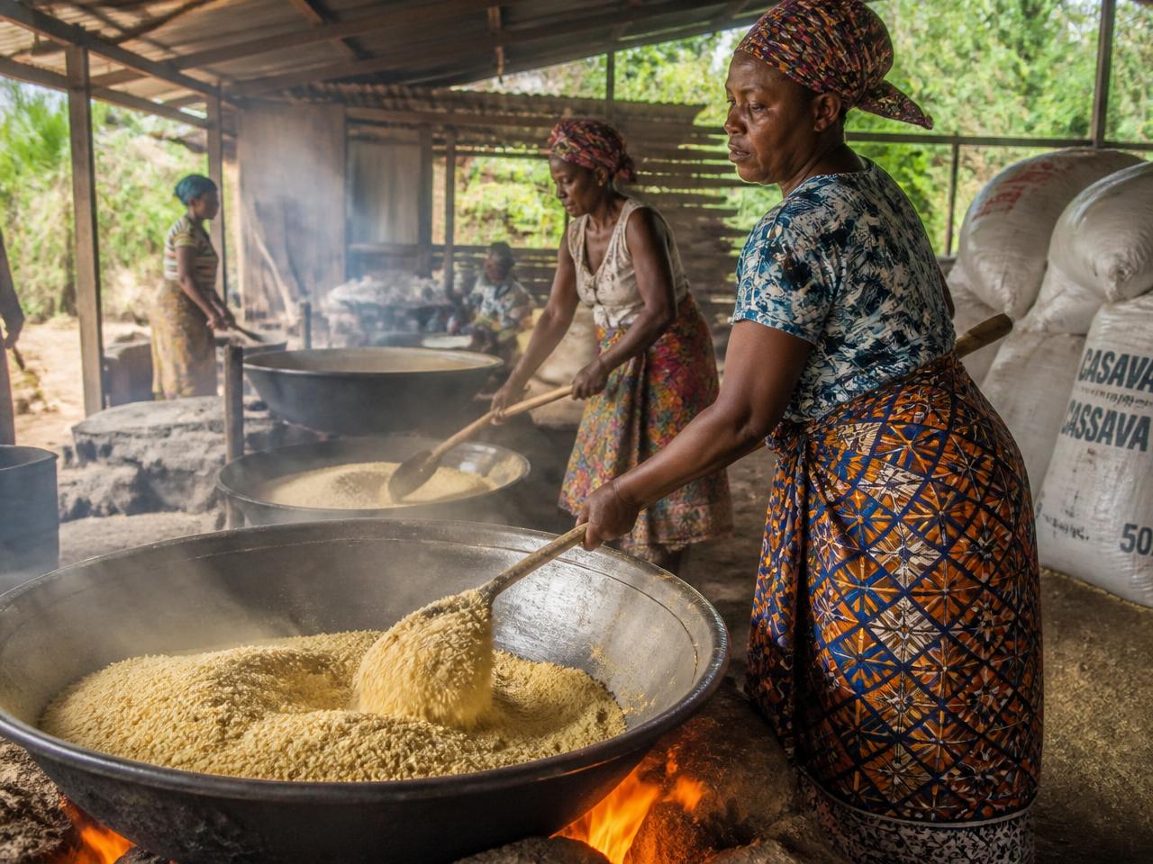 Women members processing cassava into gari at the Asetenapa gari factory